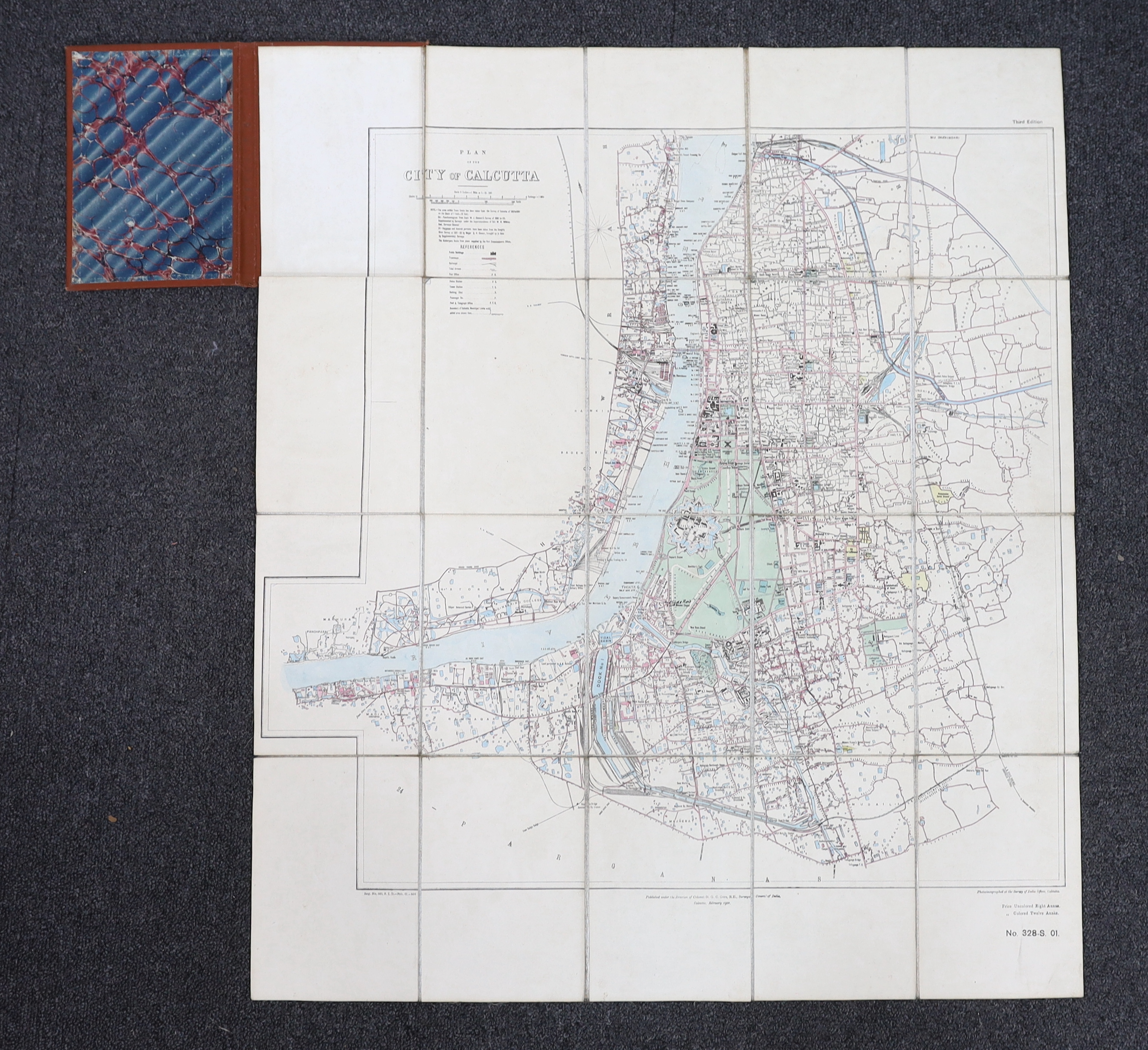 Plan of the City of Calcutta ... 3rd edition. coloured and folded on linen, opens to approx. 60x 55cm. within ruled borders, engraved title and key, scale: 3ins. to mile, contained within gilt lettered cloth covers. Surv